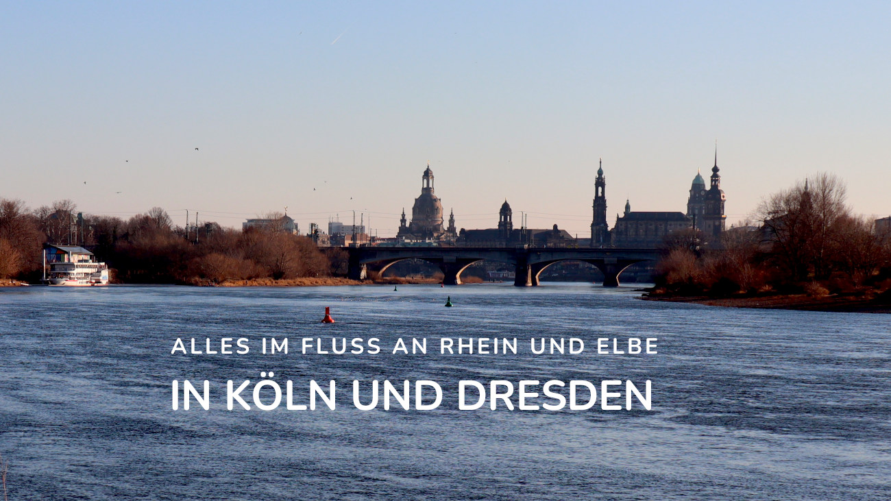 Blick von der Elbe auf die Dresdner Skyline mit dem Text: Alles im Fluss an Rhein und Elbe in Kölkn und Dresden 